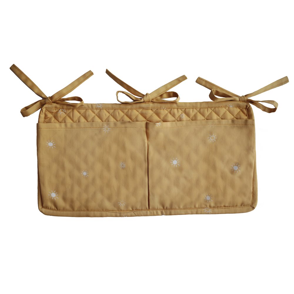 mushie Babybett Tasche Crib Pocket Organizer Sun