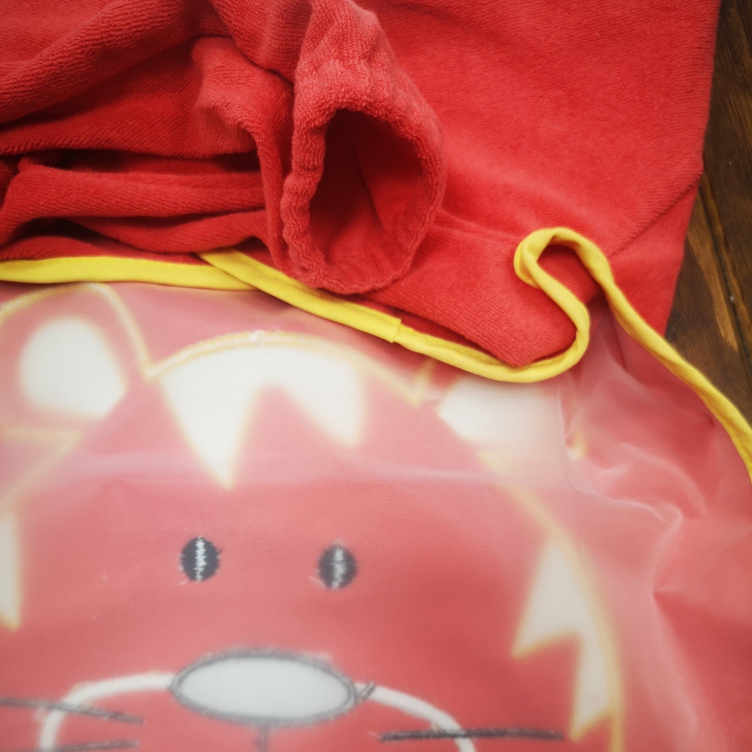 Playshoes Ärmellätzchen Tiger Rot Rückseite